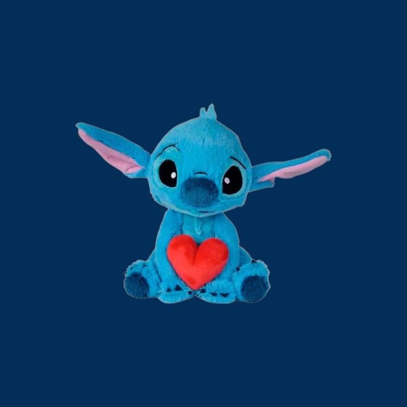 Magic Tour Club blauwe Stitch knuffel van 25 cm met een zacht rood hart, gemaakt van hoogwaardig pluche materiaal.