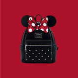 Magic Tour Club Loungefly Disney Minnie Mouse rugzak in zwart kunstleer met iconische rode strik en Mickey-patroon
