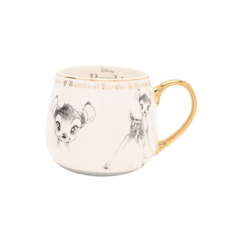 Magic Tour Club crèmekleurige Disney Bambi mok met gouden oor en verfijnde schetsillustraties van het hertje.