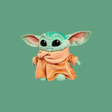 Magic Tour Club Baby Yoda knuffel van 25 cm met grote ogen en beige gewaad uit The Mandalorian