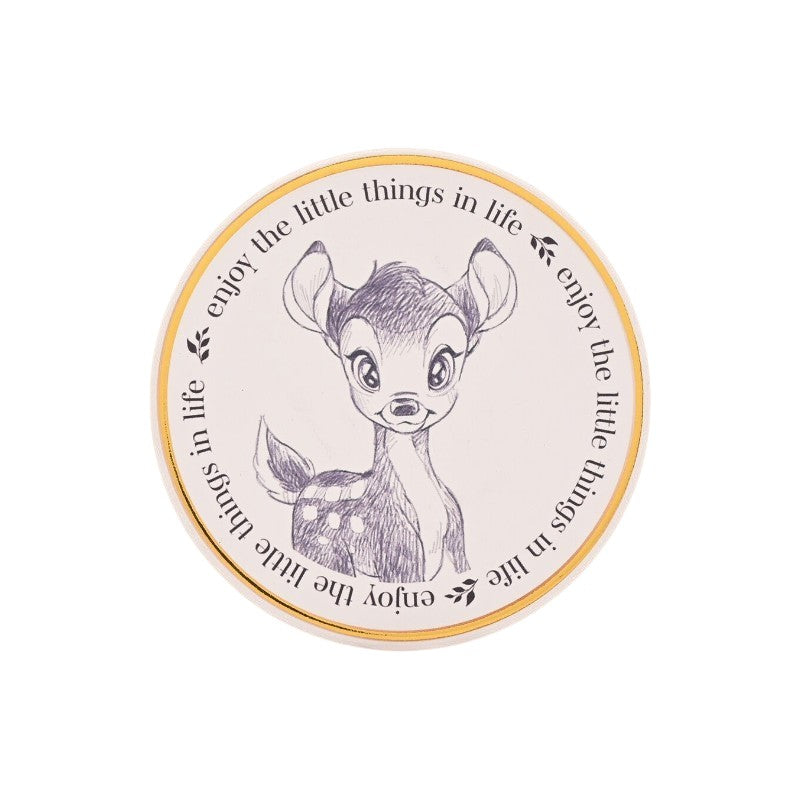 Magic Tour Club ronde onderzetter met een Bambi schets en de tekst enjoy the little things in life op een beige achtergrond