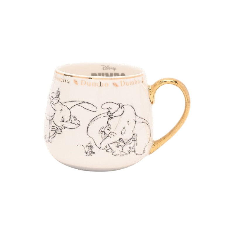 Magic Tour Club Disney Dumbo mok met gouden rand en handvat, versierd met een zwarte lijntekening van Dumbo.